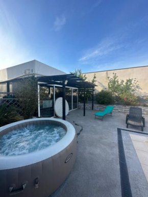 Superbe appartement avec piscine et spa privatif